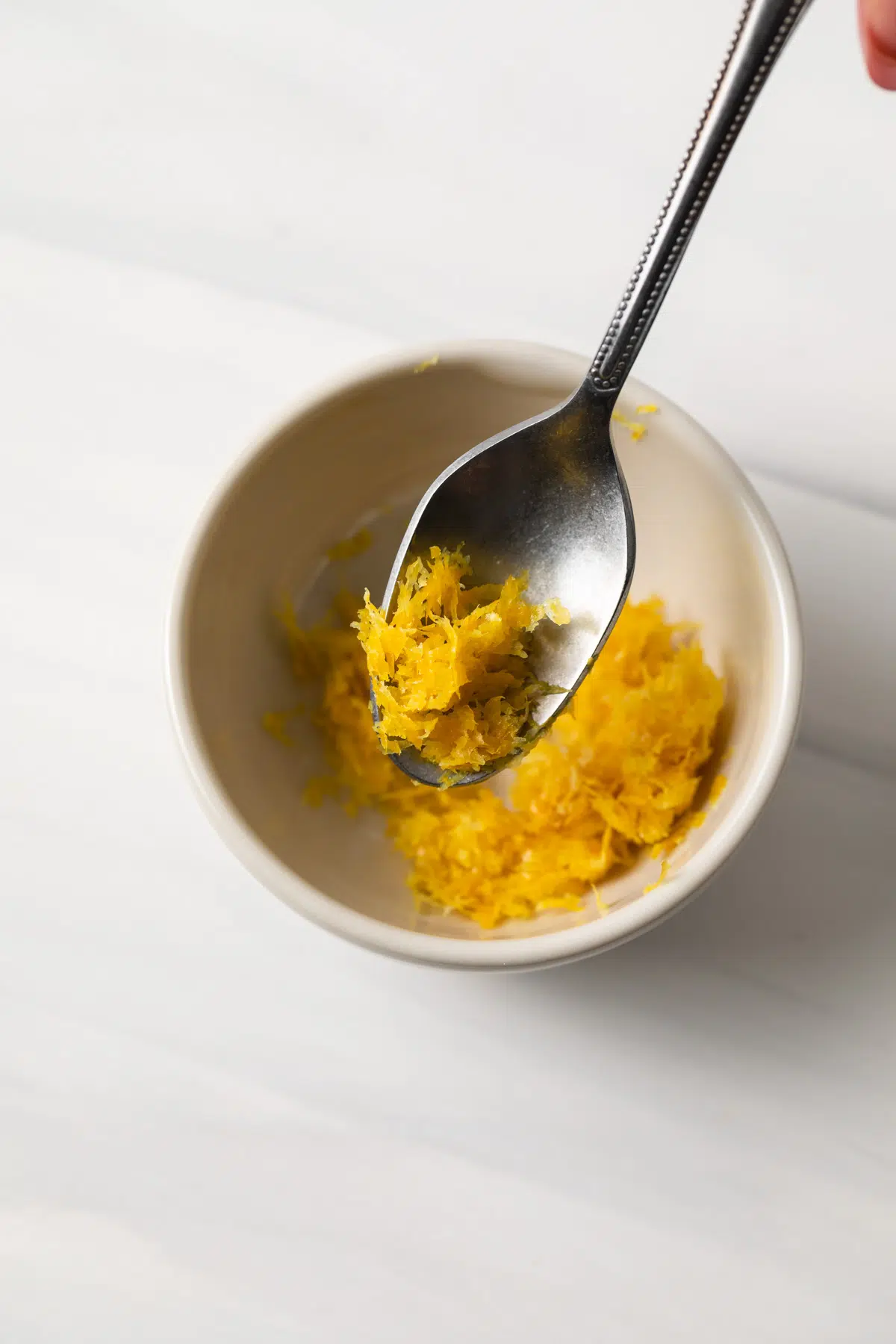 Lemon zest on a spoon.