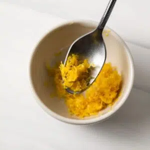 Lemon zest on a spoon.