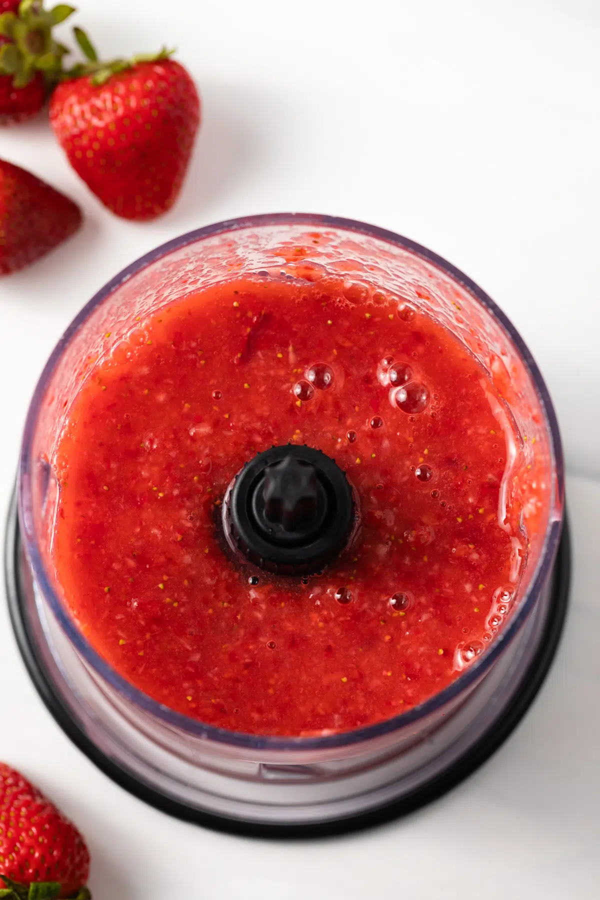 Strawberry puree in a food processor.