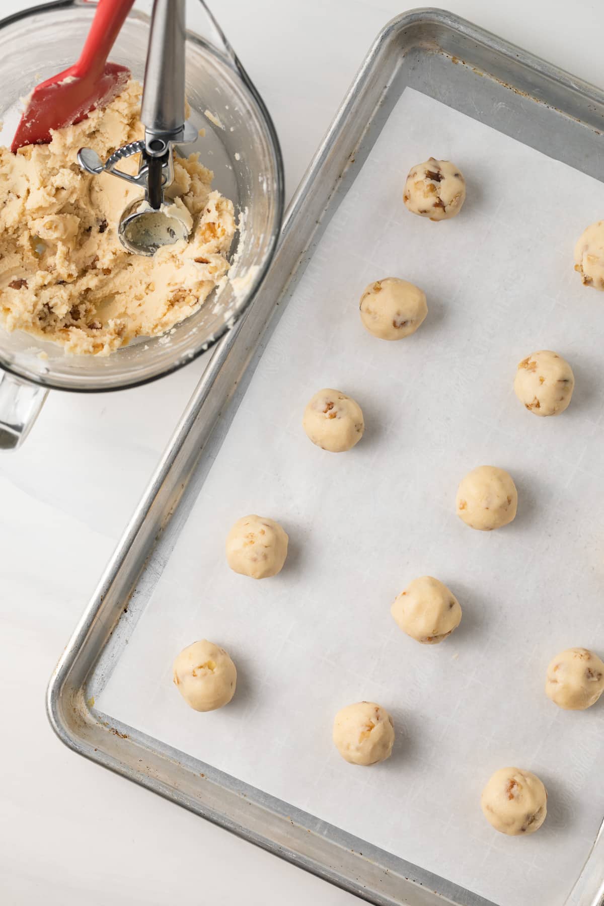 Rolled cookie dough on baking sheet.