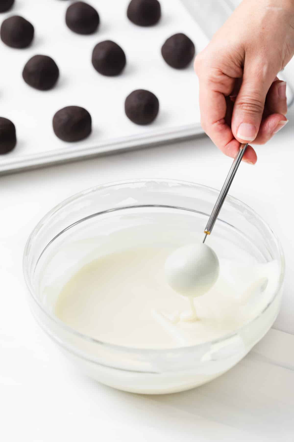 Oreo ball dipped in white chocolate.