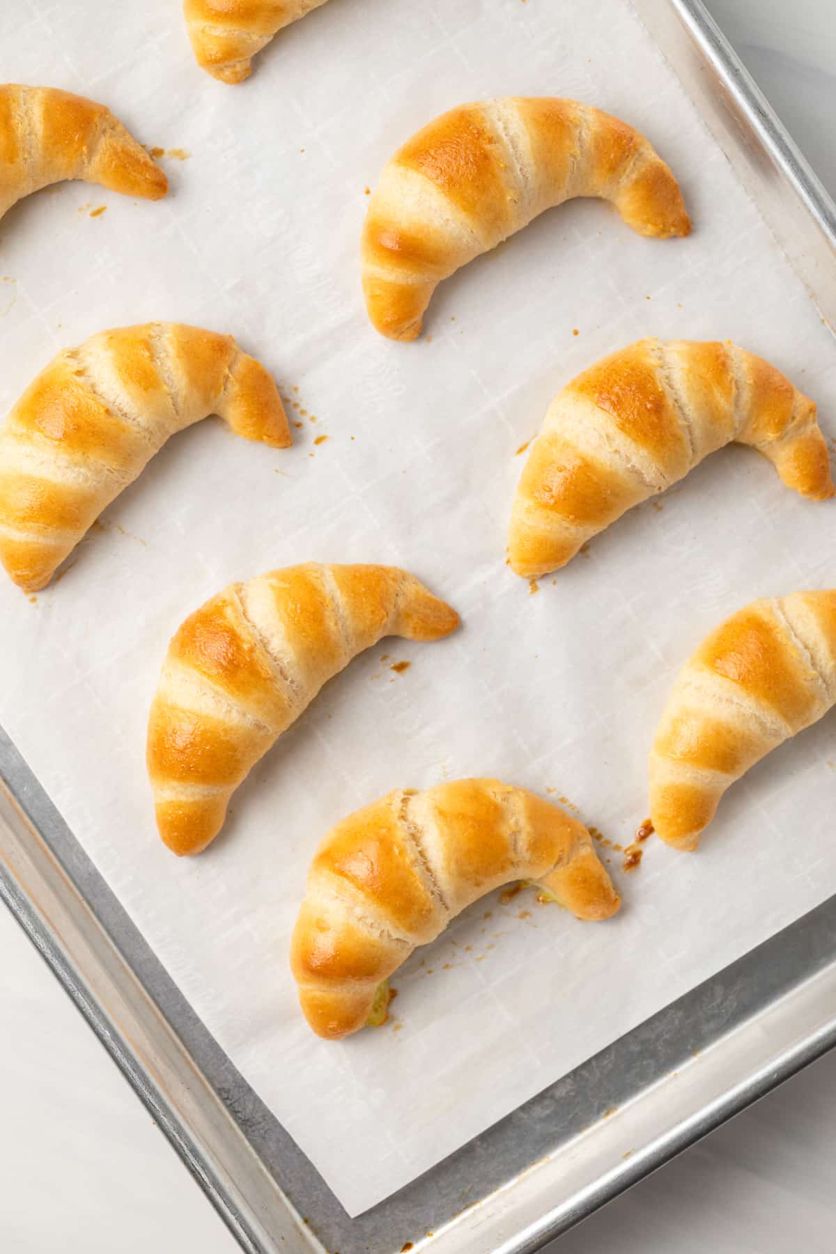 Baked crescent rolls with egg wash.