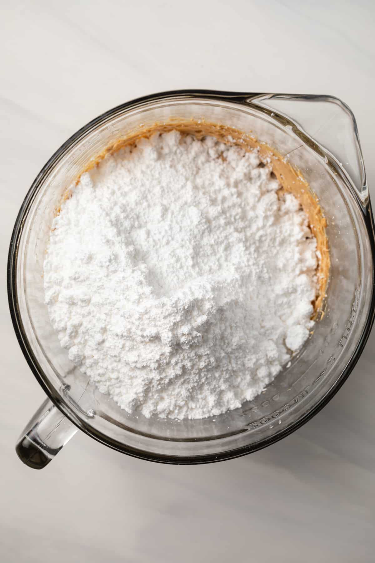 Powdered sugar added to peanut butter mixture.