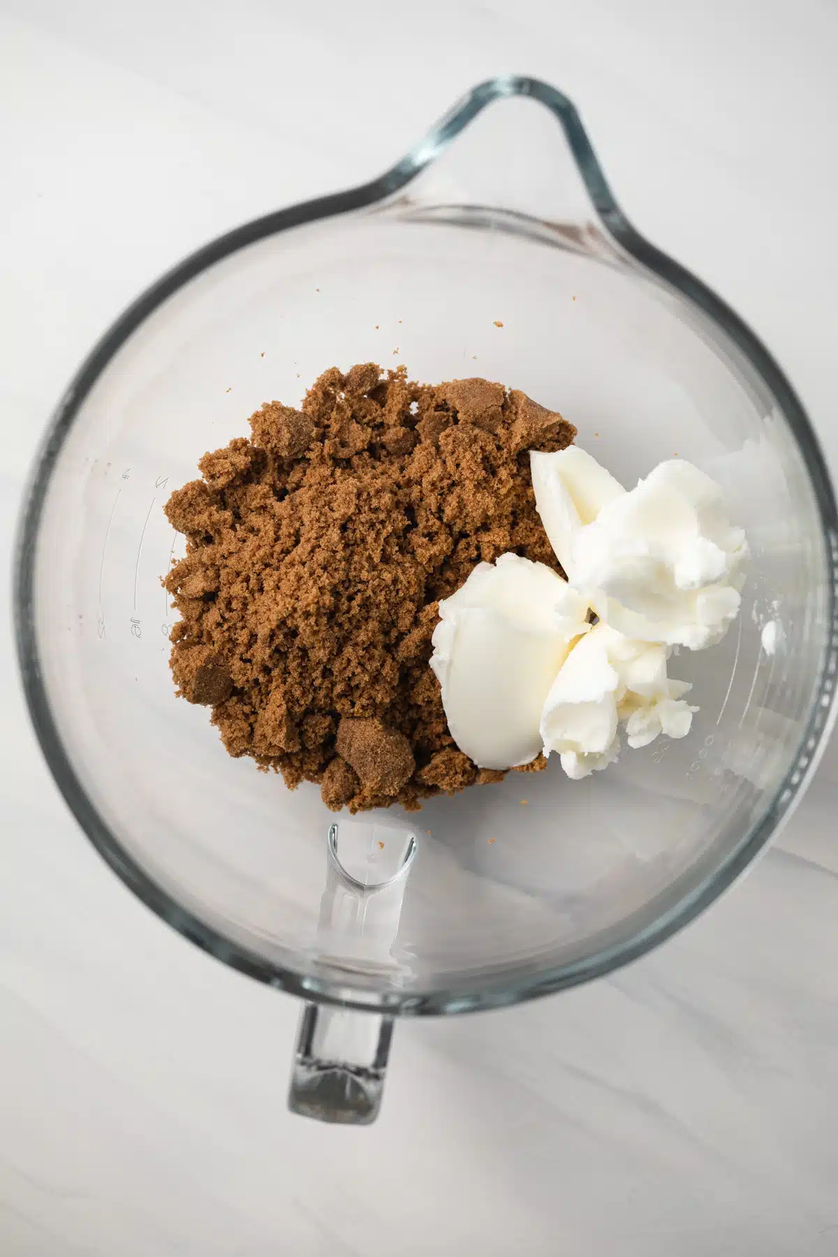 Brown sugar and shortening in glass bowl.