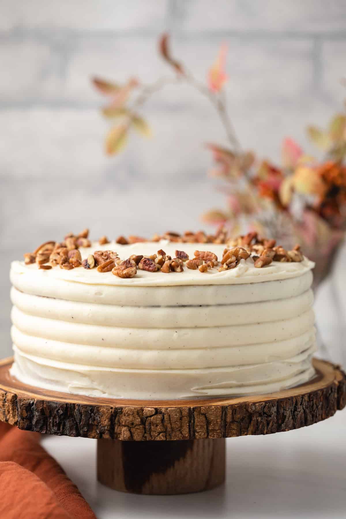 Spice cake on brown cake stand.