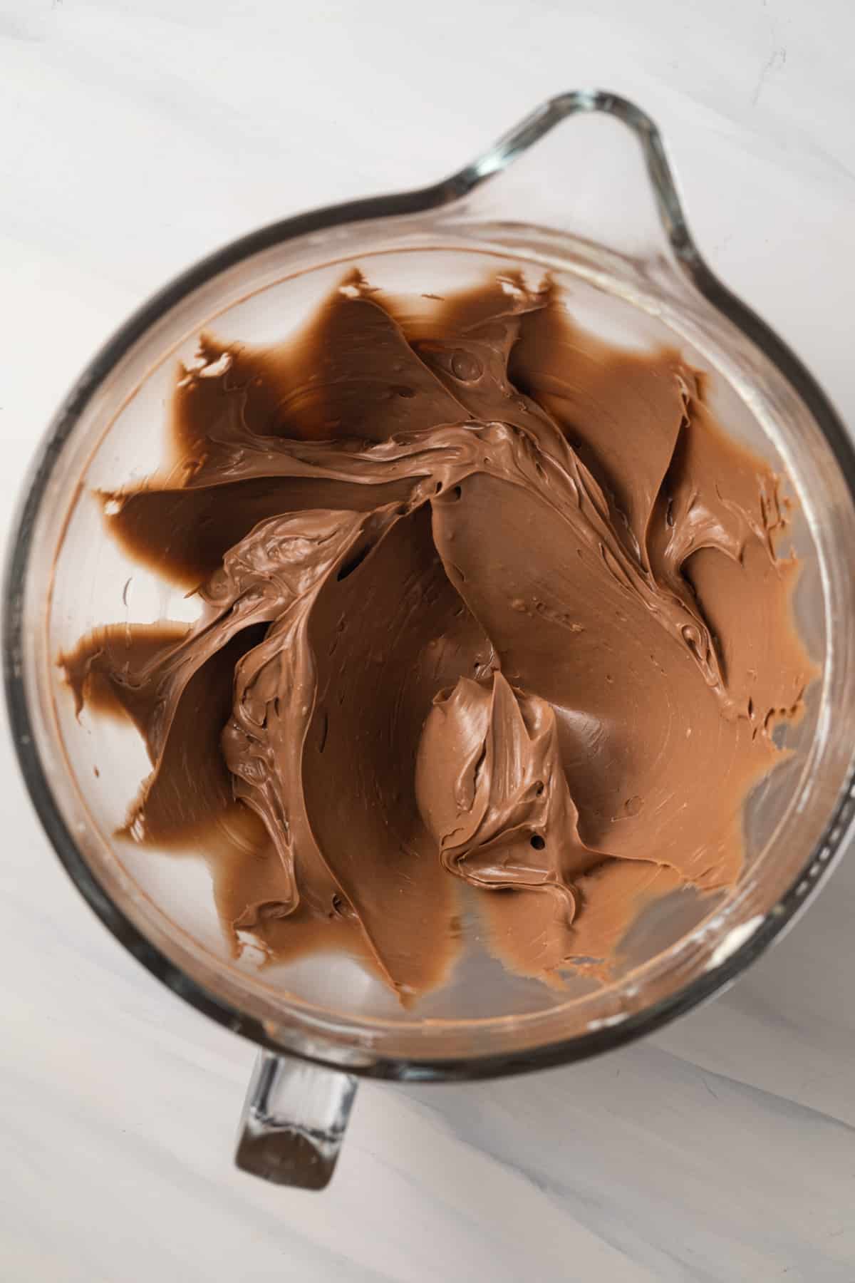 Nutella frosting in mixing bowl.