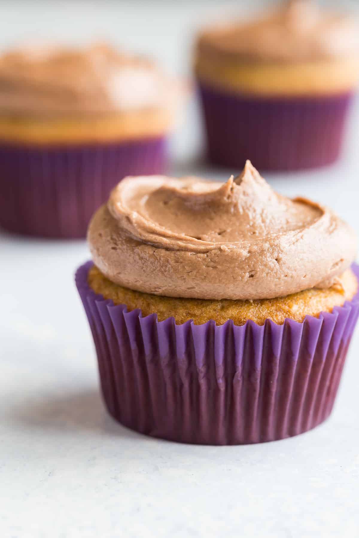 Banana cupcakes topped with Nutella frosting.
