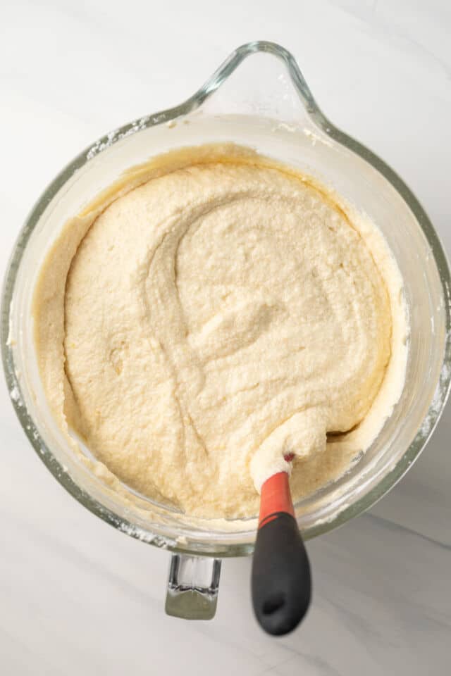 Lemon pound cake batter in mixing bowl.