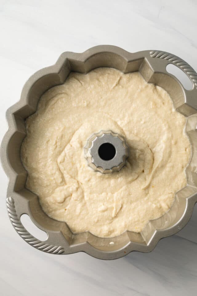 Lemon pound cake batter in bundt pan.