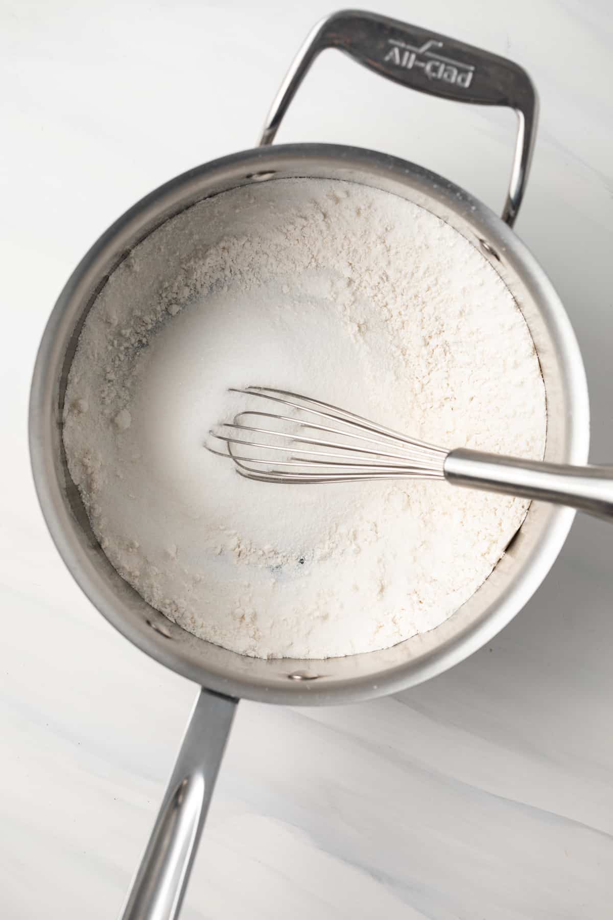 Flour and sugar in saucepan.