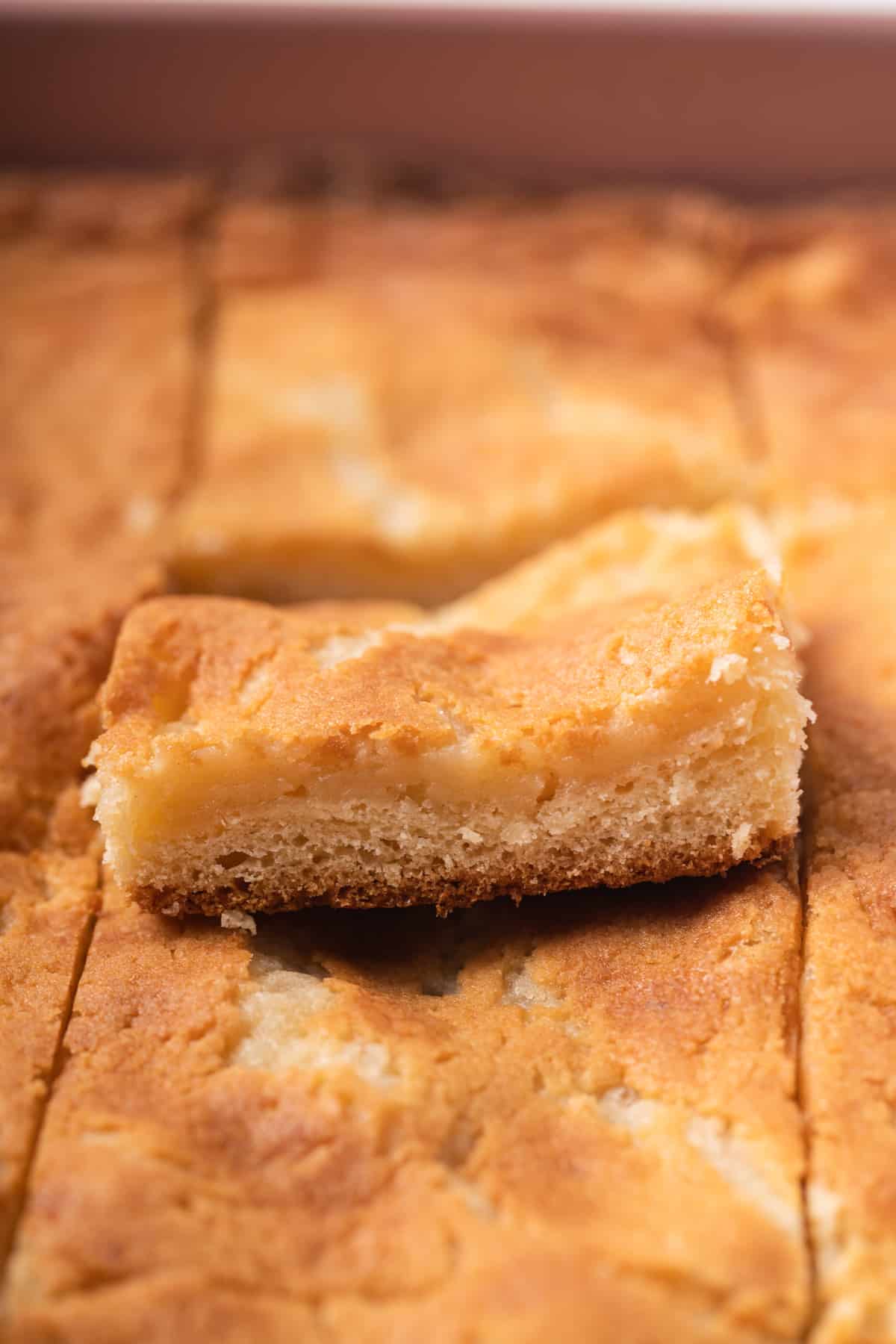 Close up of slice of gooey butter cake.