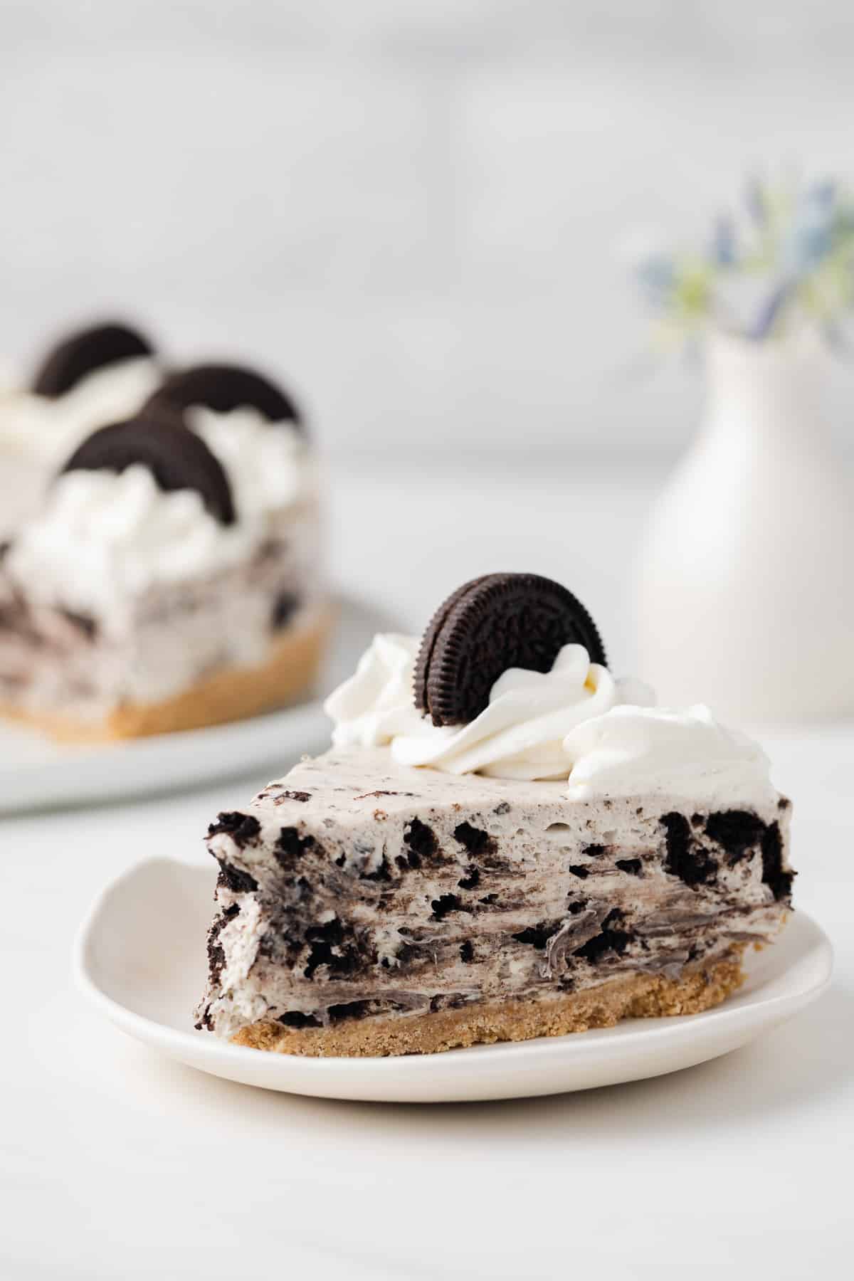 Side view of slice of Oreo Cheesecake.