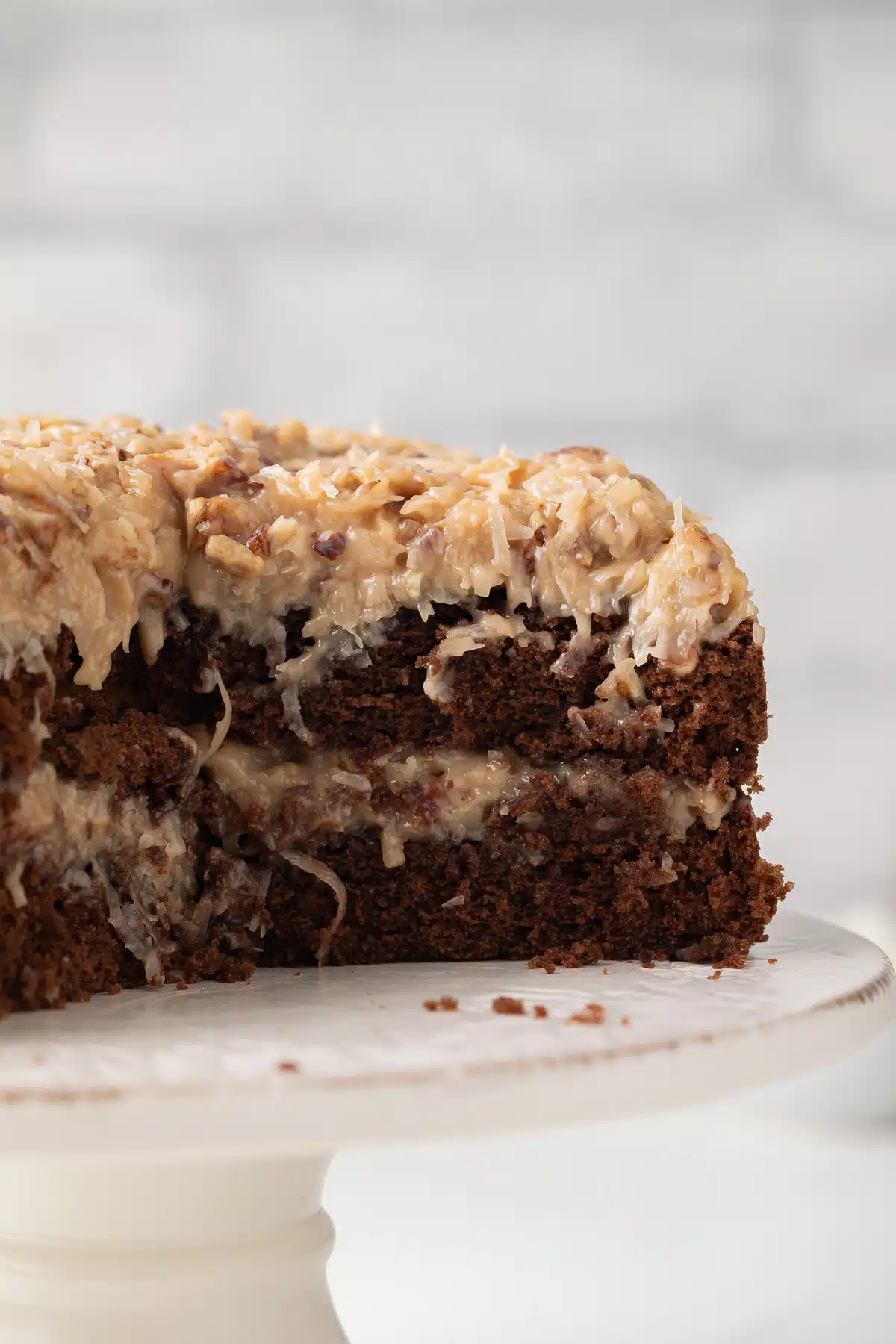 Inside of German chocolate cake with slices taken out.