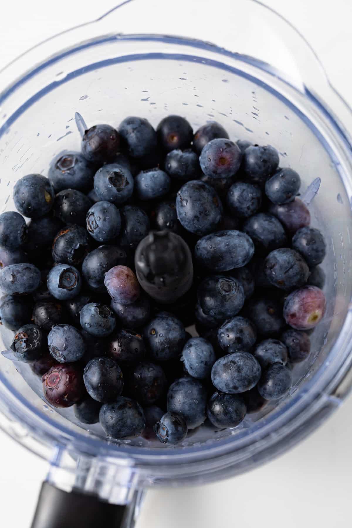 Whole blueberries in blender.