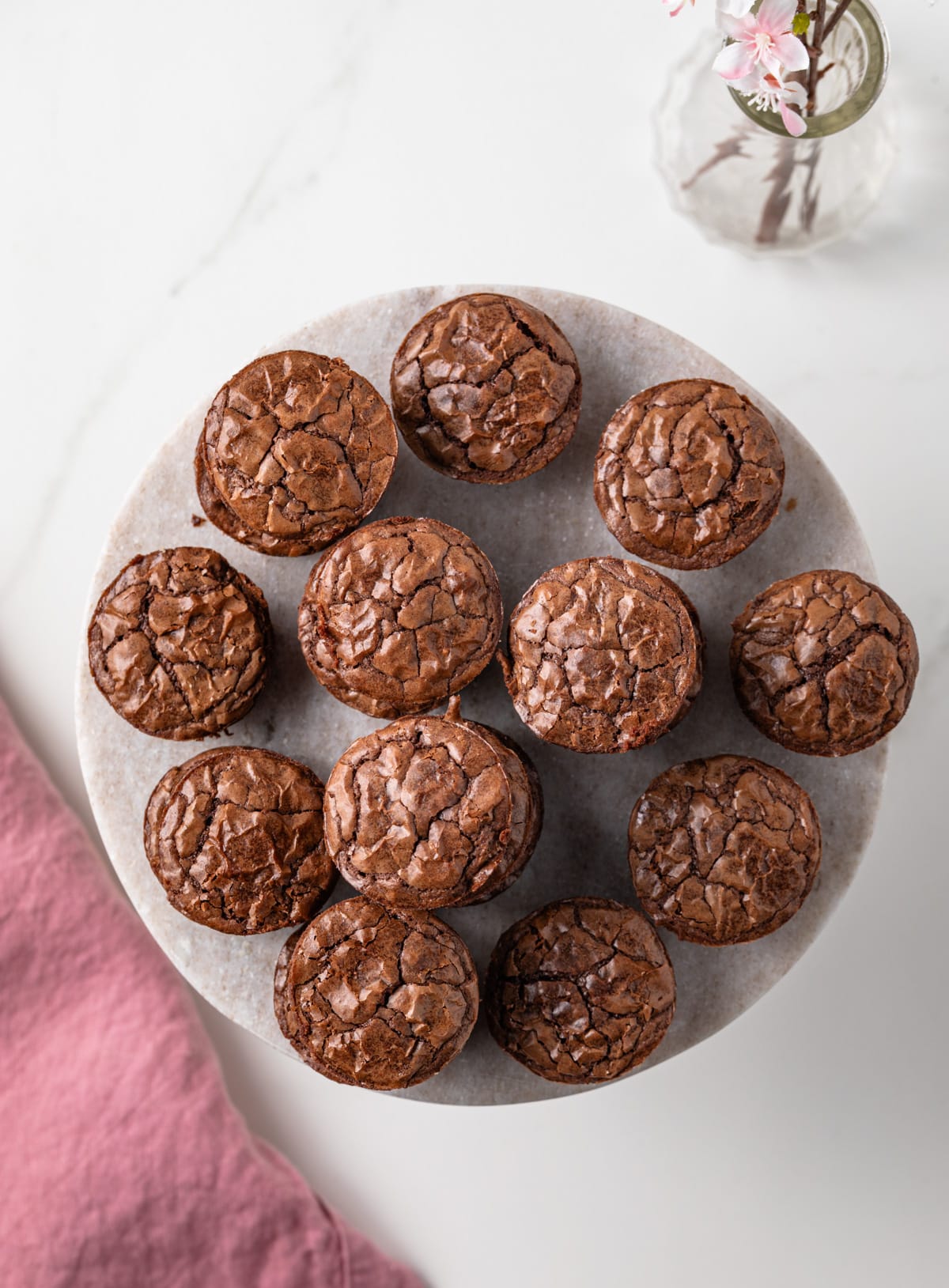 Overhead of brownie bites on cake stand.