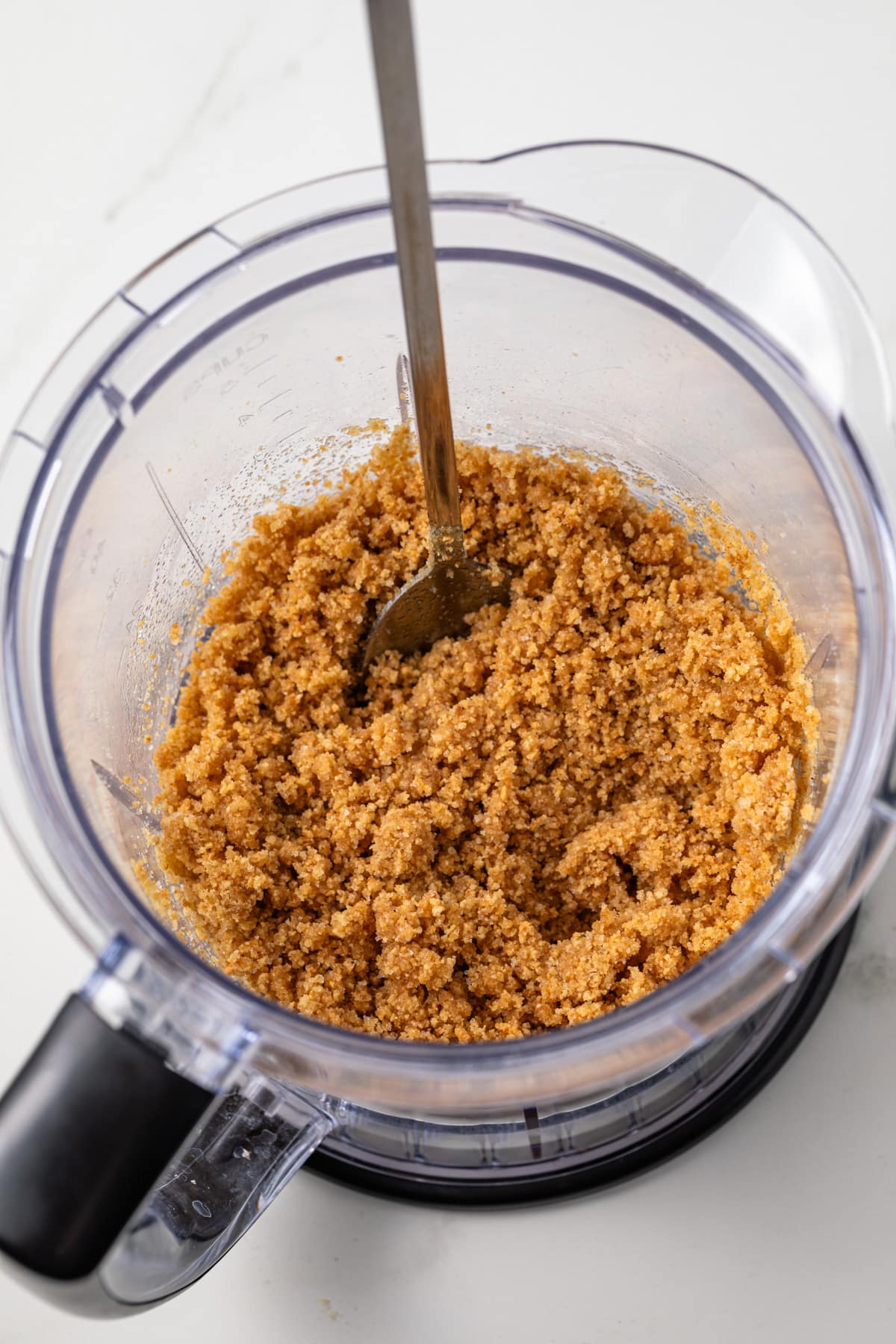 Crushed graham crackers in a blender.