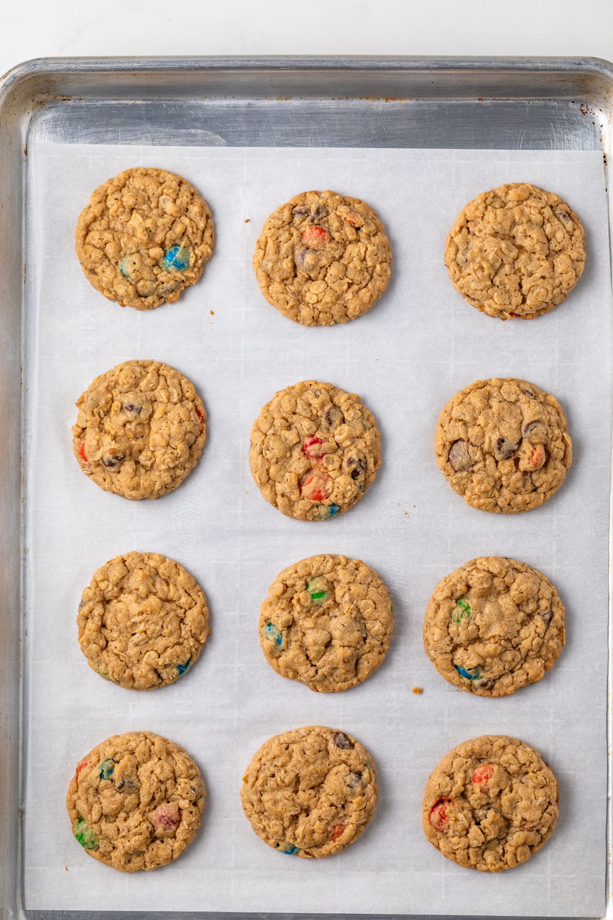 Baked cookies on a sheet pan.
