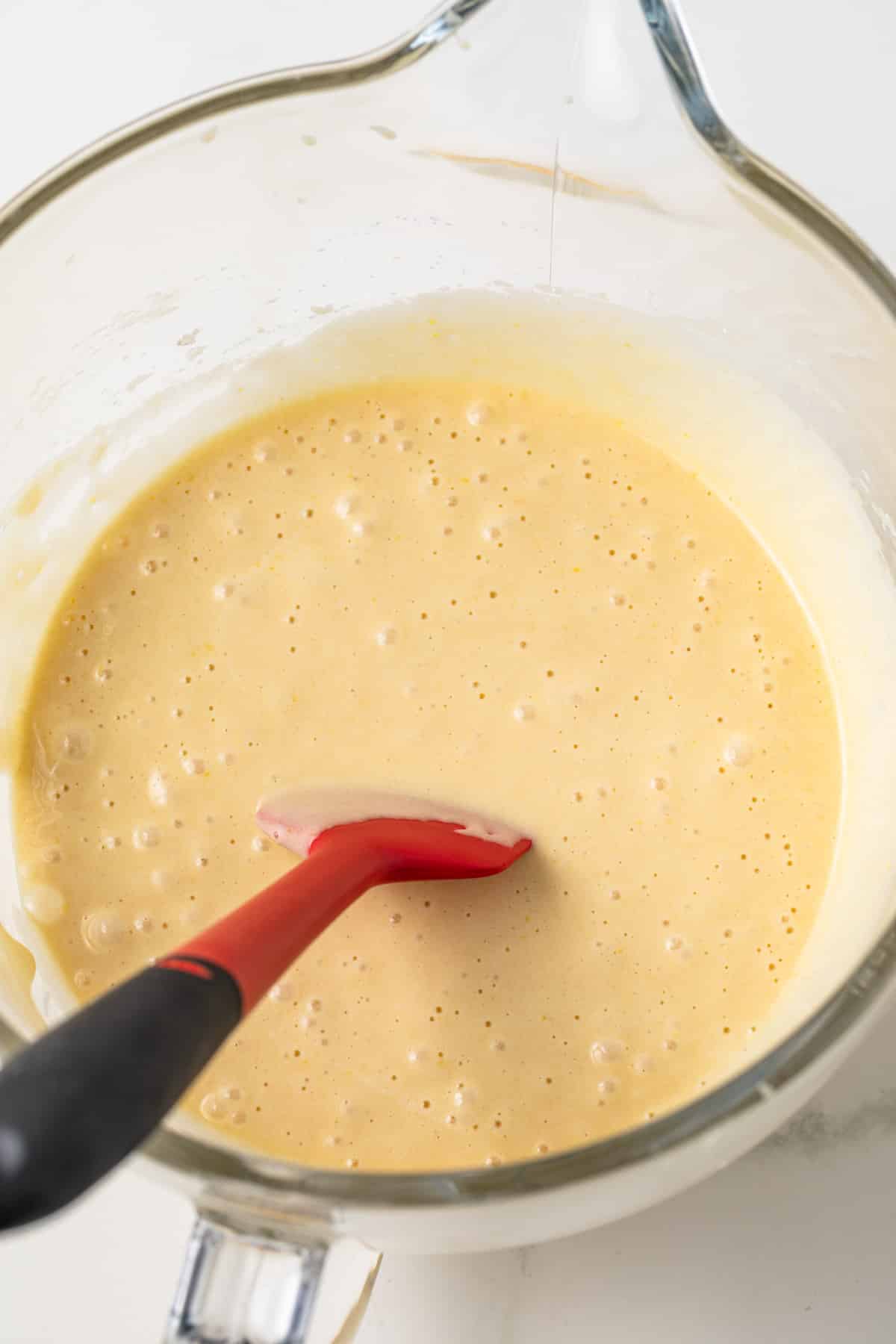 Cake batter in glass bowl.