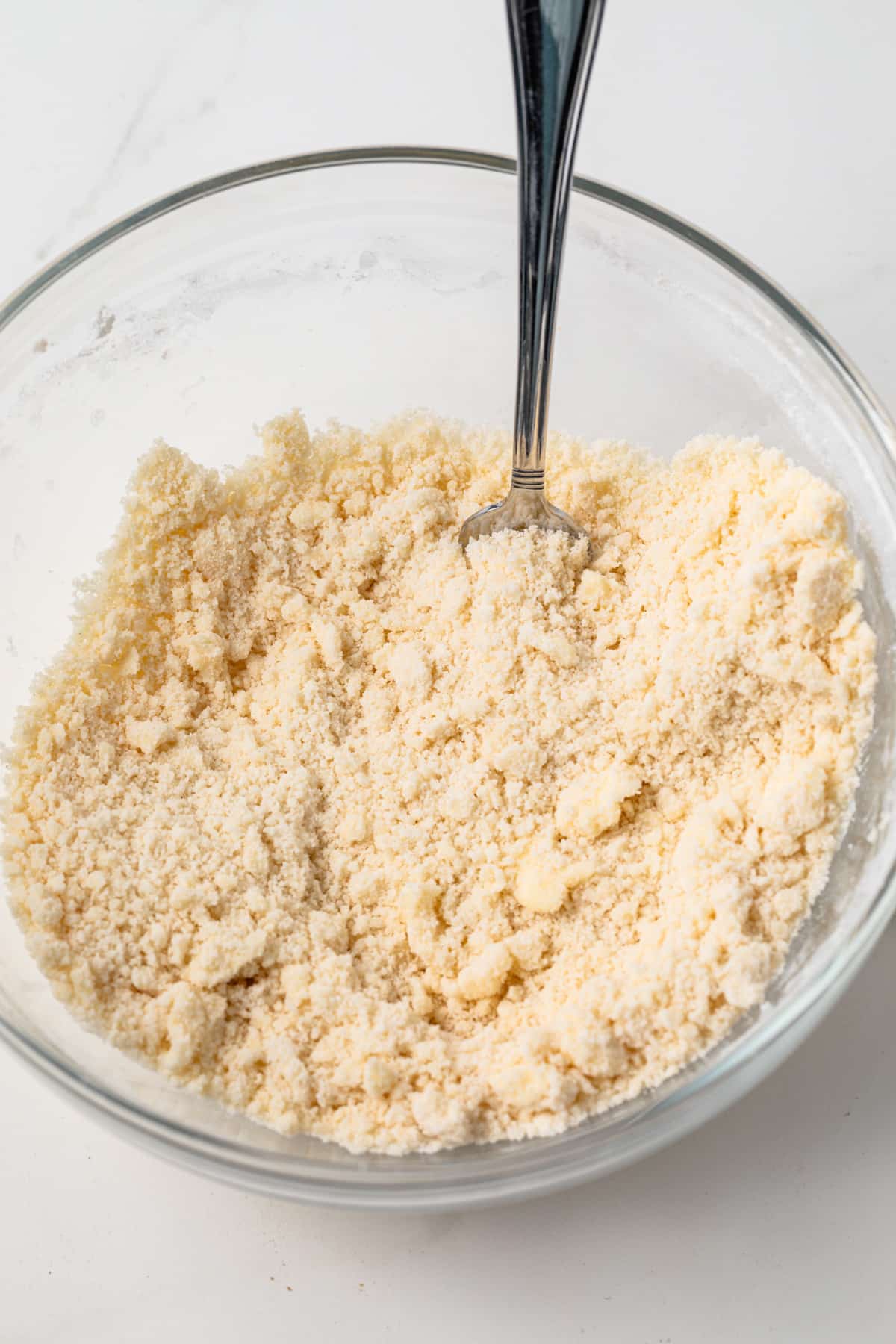 Crumb topping in glass bowl.