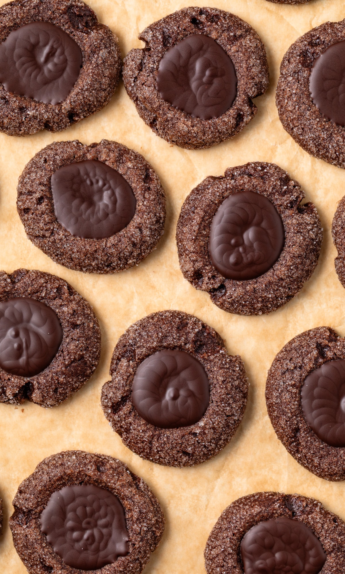 Overhead of chocolate thumbprint cookies.