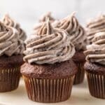 Oreo frosting over chocolate cupcakes.