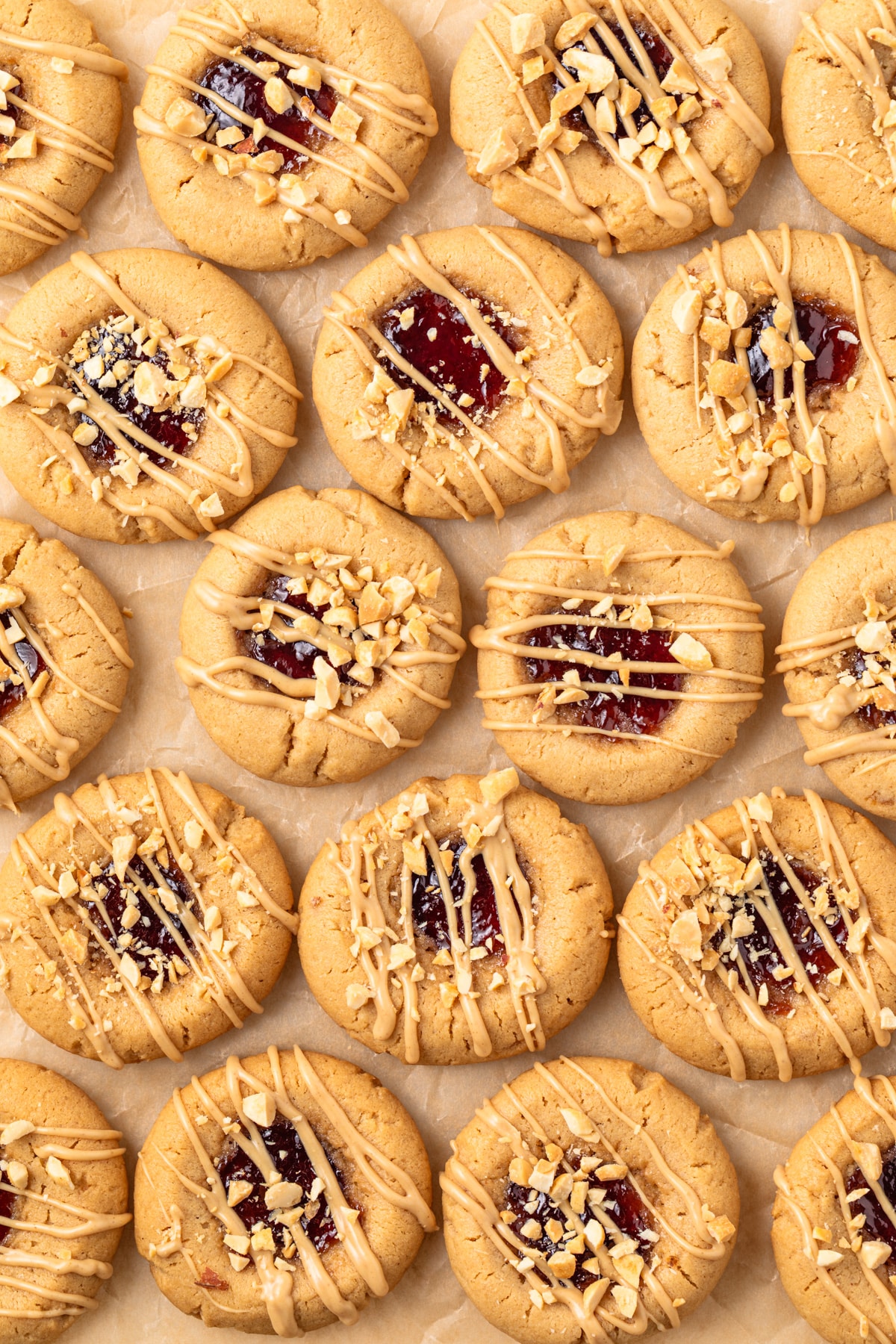 Overhead view of peanut butter and jelly cookies.