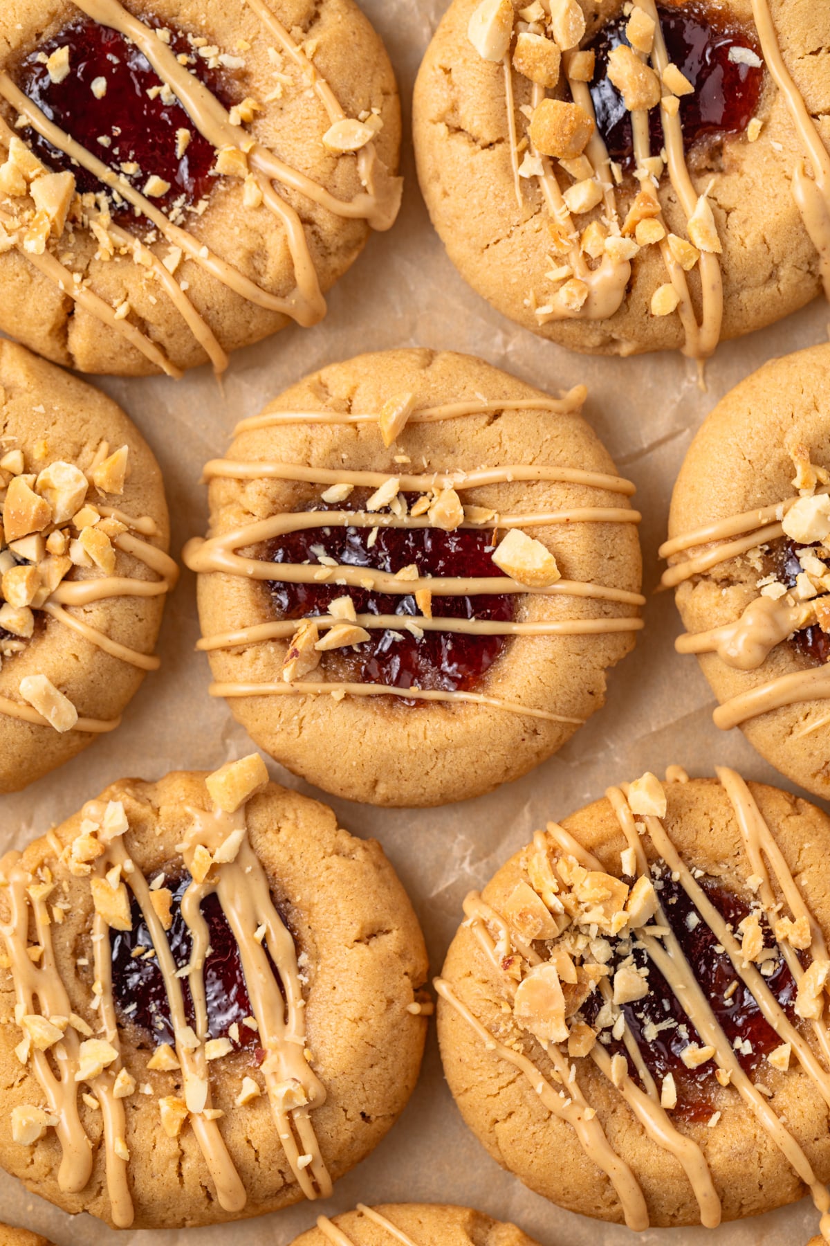 Close up view of peanut butter and jelly cookies.