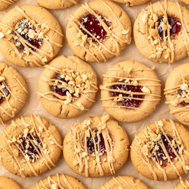 Overhead view of peanut butter and jelly cookies.
