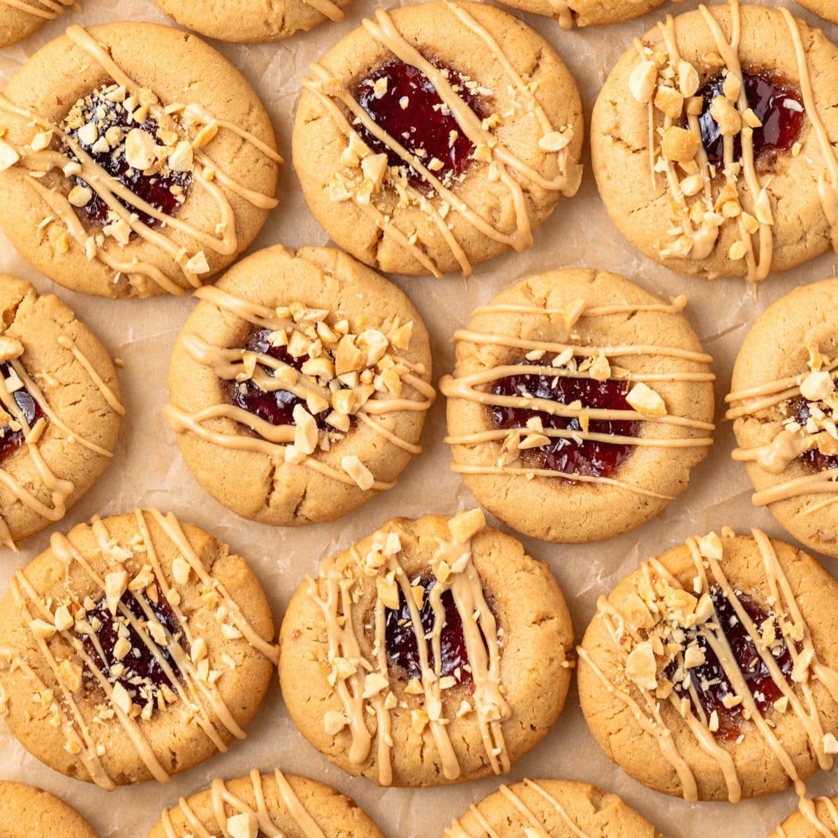 Overhead view of peanut butter and jelly cookies.