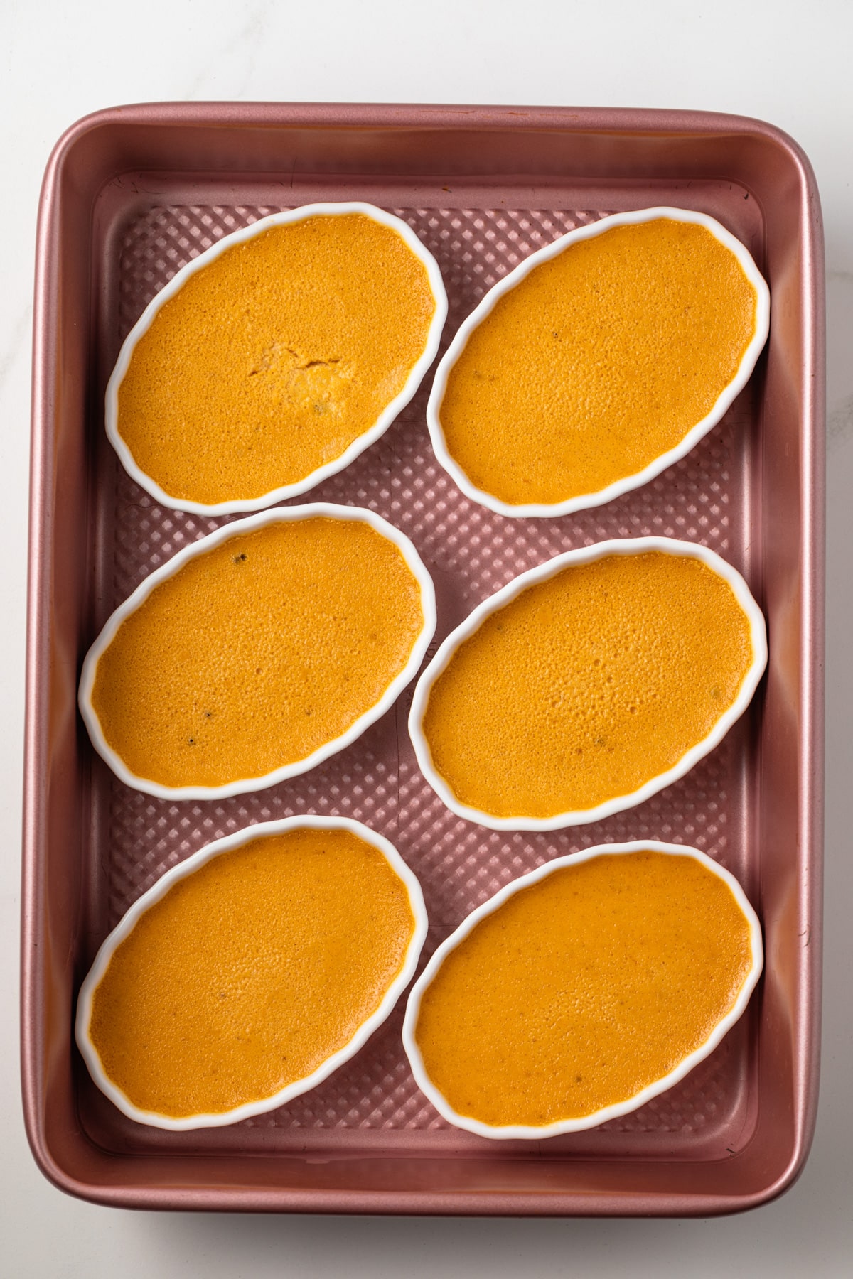 Baked creme brulee in ramekins.