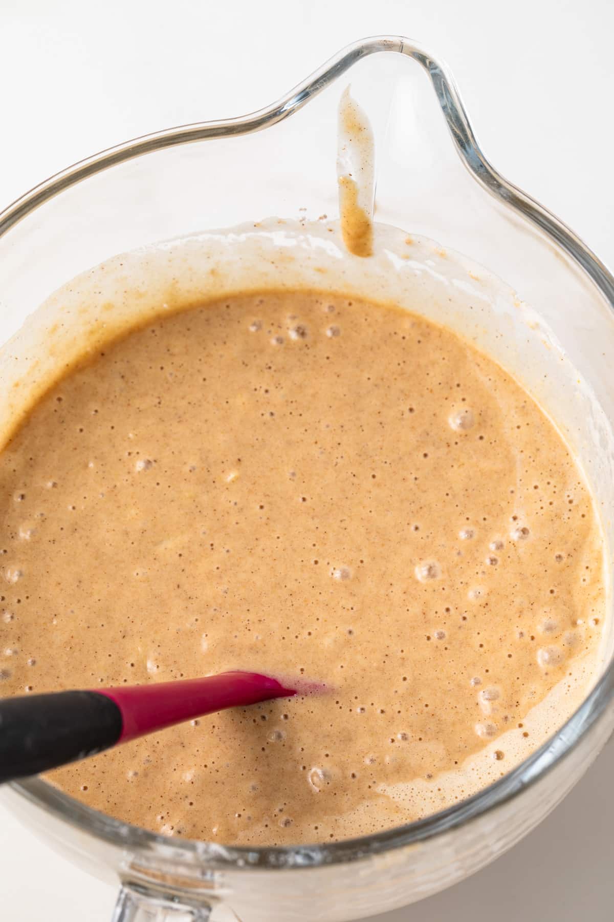 Cake batter in glass bowl.