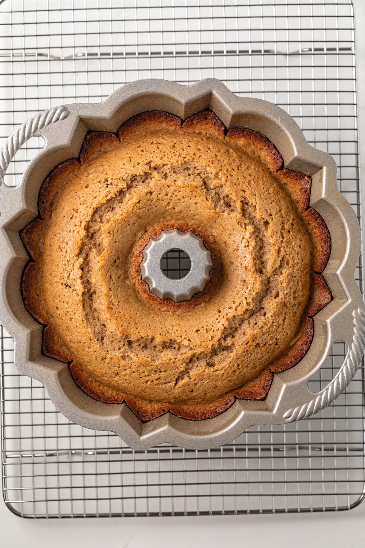 Baked cake in bundt pan.