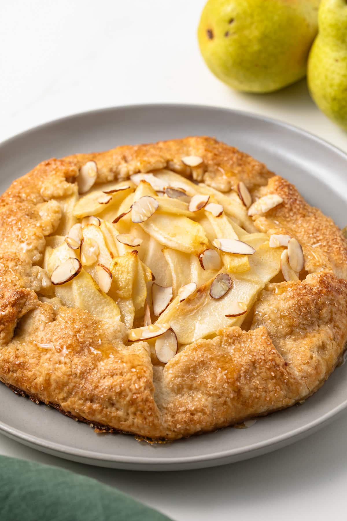 Side view of pear almond crostata.