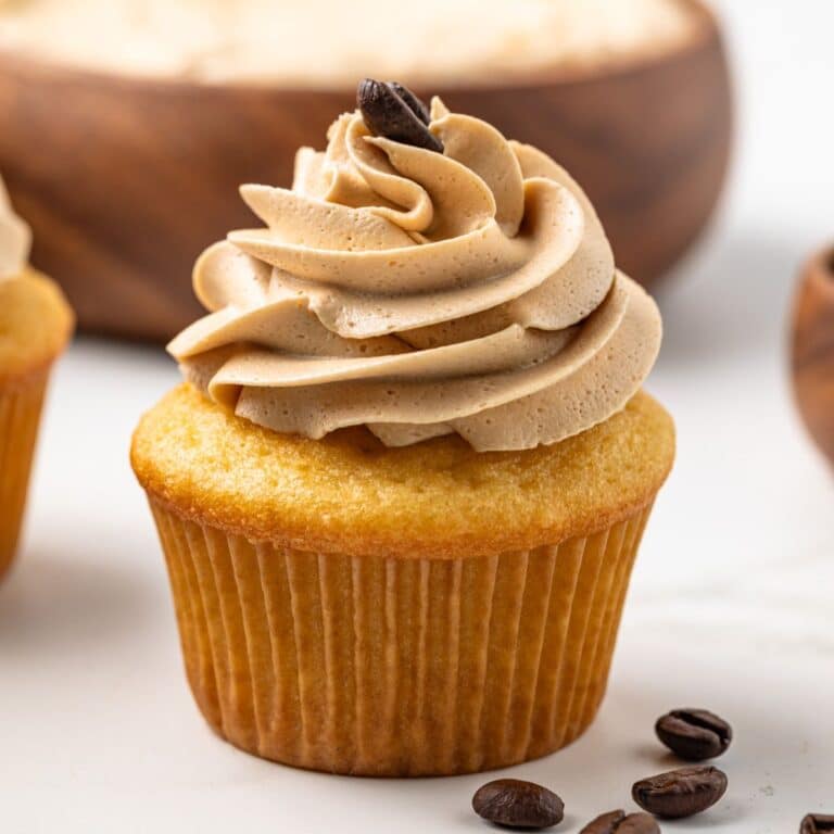 Vanilla cupcakes frosted with coffee frosting.