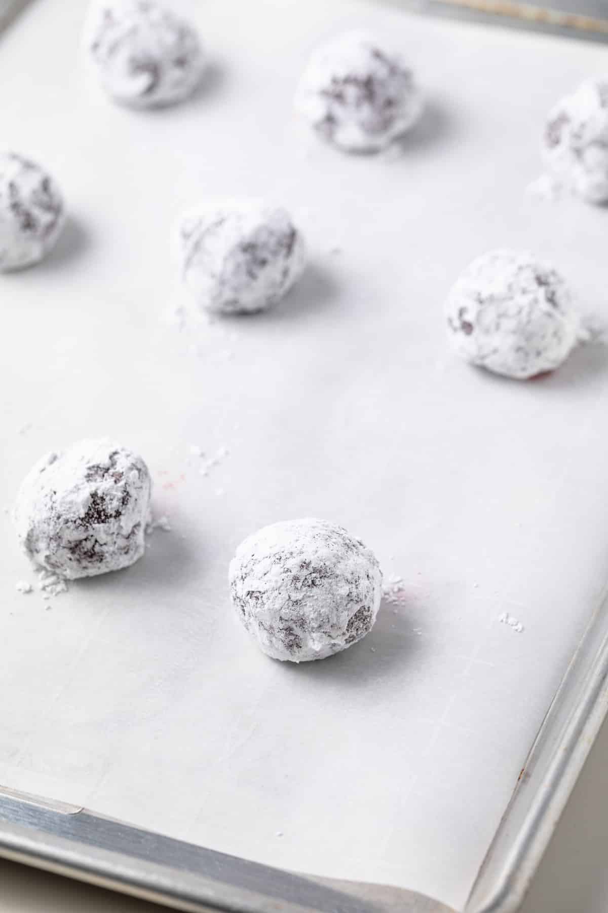 Unbaked cookies on a baking sheet.