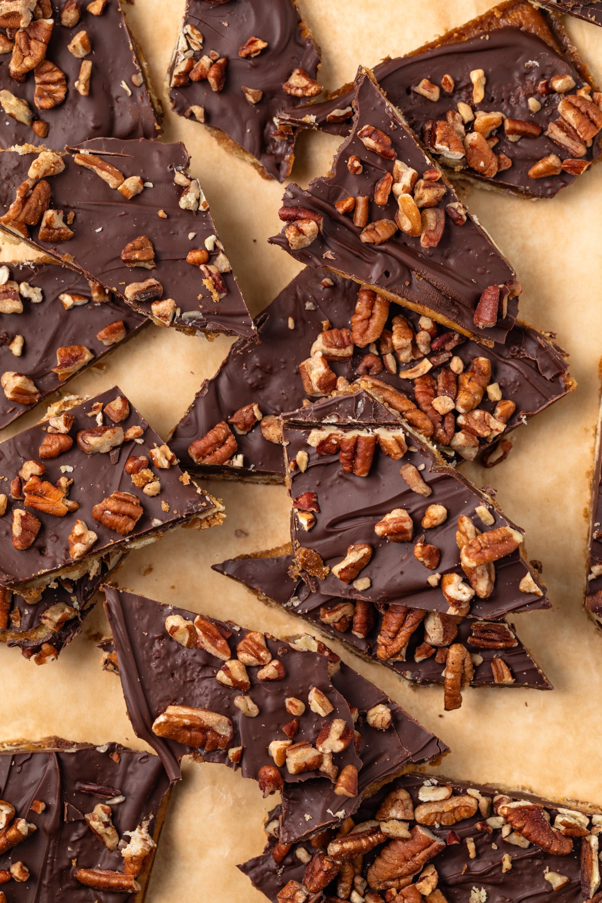 Saltine cracker toffee on parchment paper.