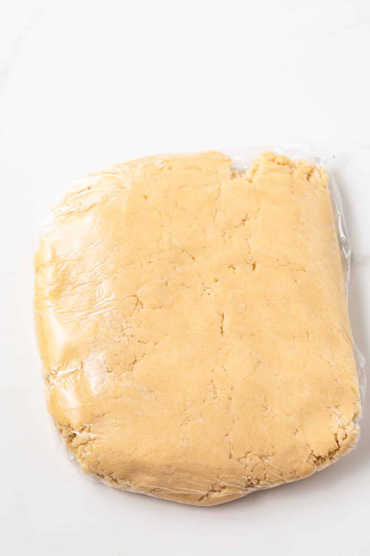 Cookie dough in plastic wrap.