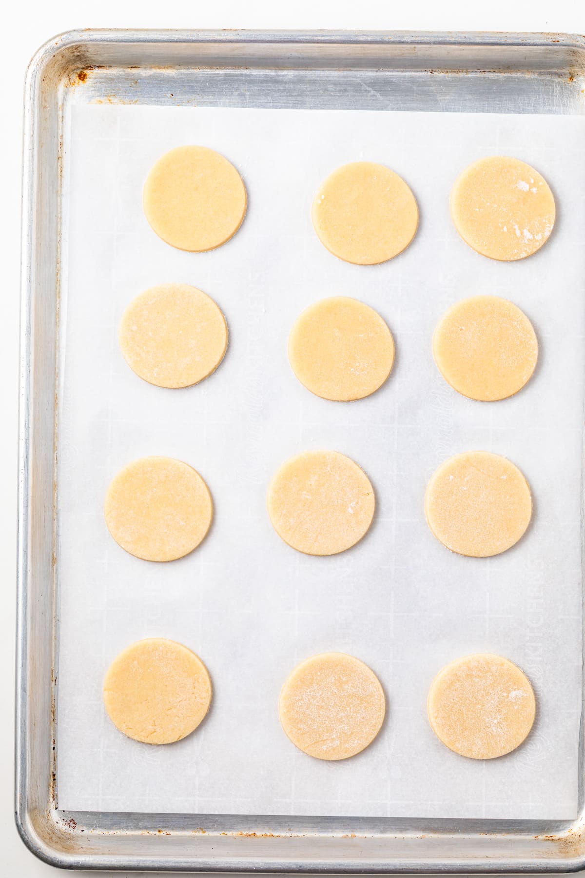 Unbaked cookies on a baking sheet.