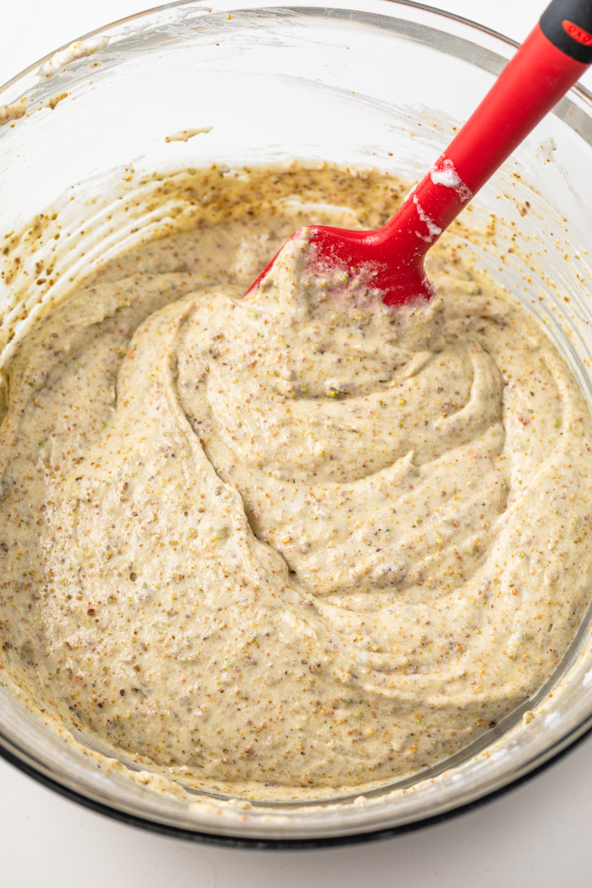 Cake batter in a glass bowl.