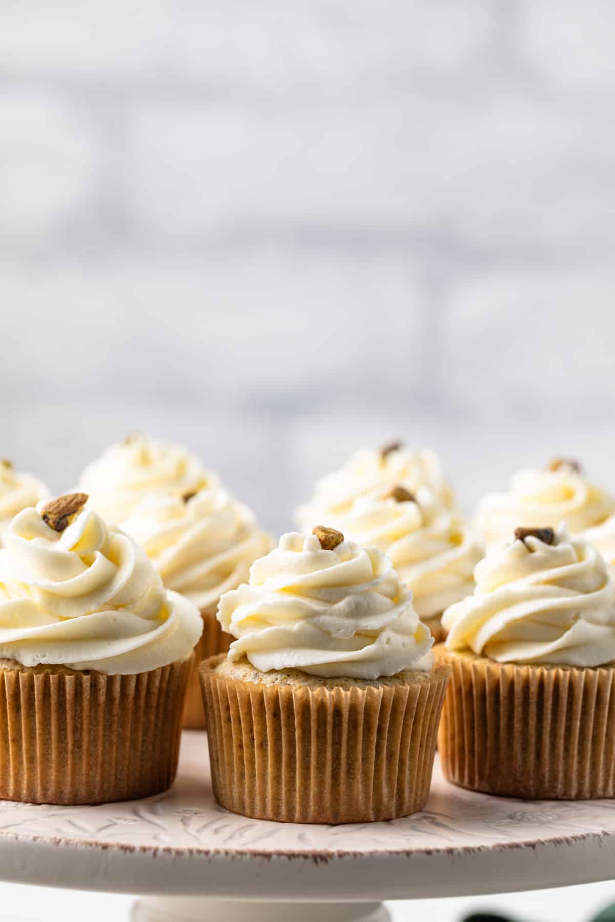 Side view of pistachio cupcakes.
