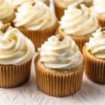 Pistachio cupcakes with whipped cream cheese frosting.