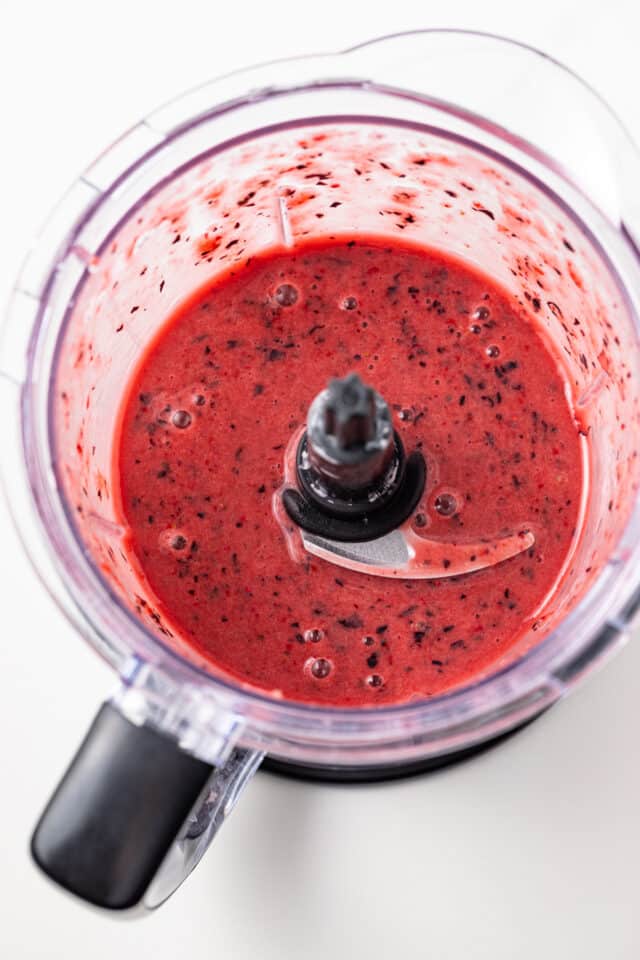 Mixed berry puree in a food processor.