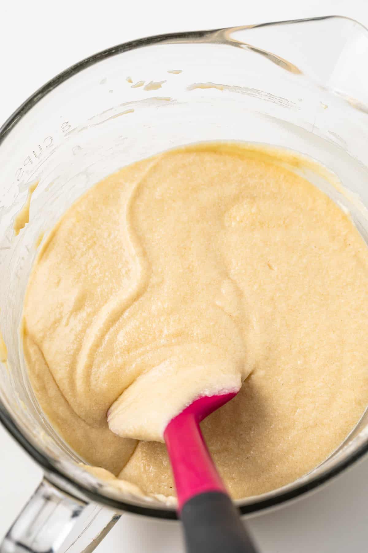 Coffee cake batter in a glass bowl.