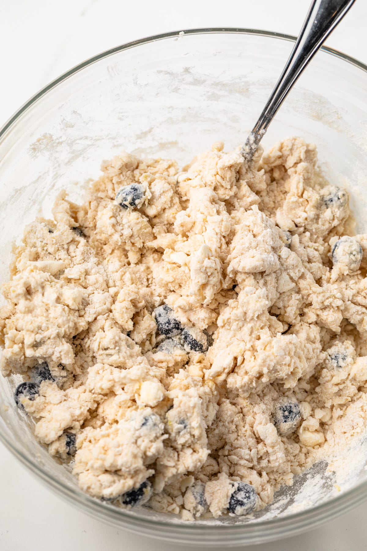 Scone dough in a glass bowl.