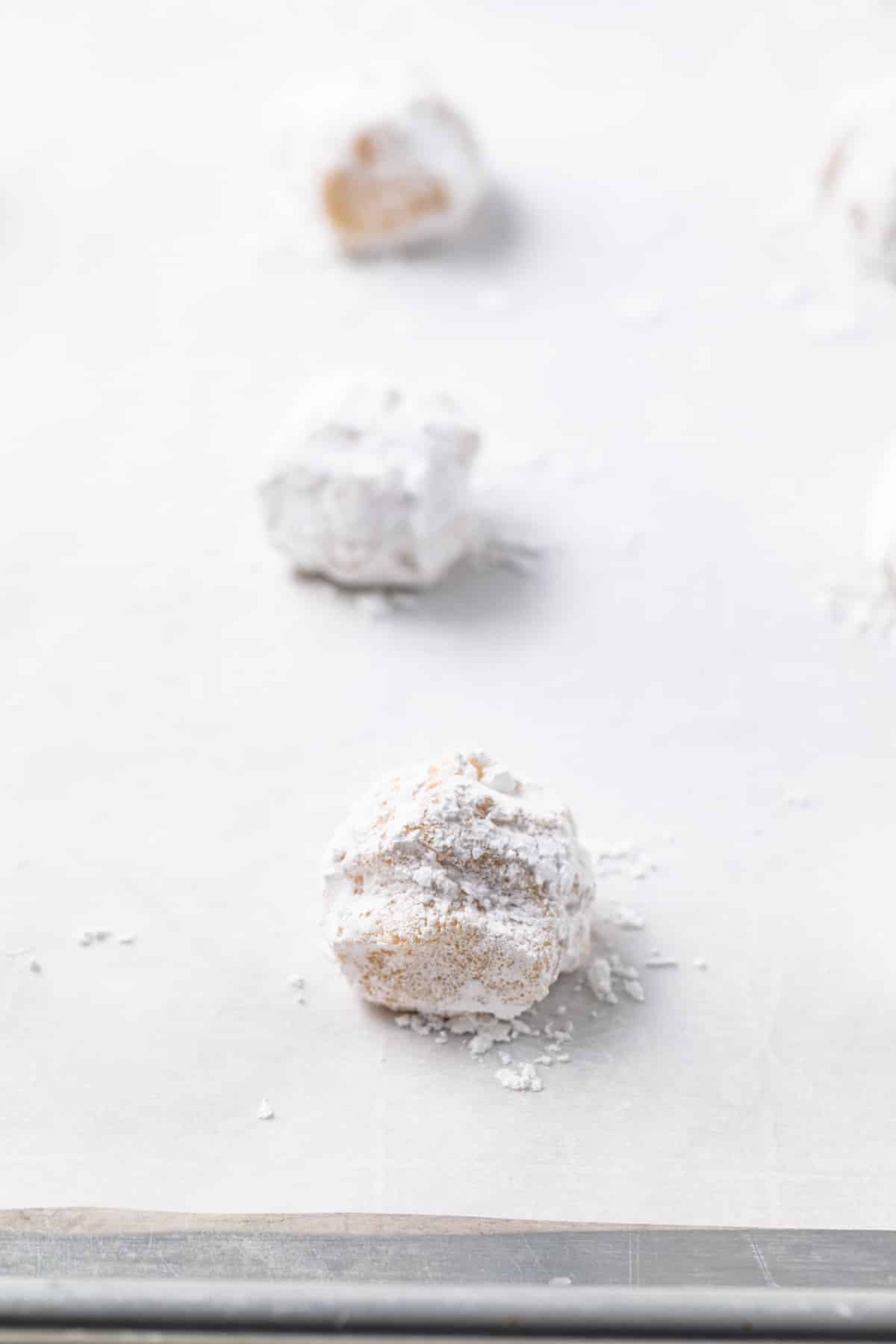 Cookie dough rolled in powdered sugar.