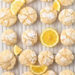 Lemon crinkle cookies in a wire rack.